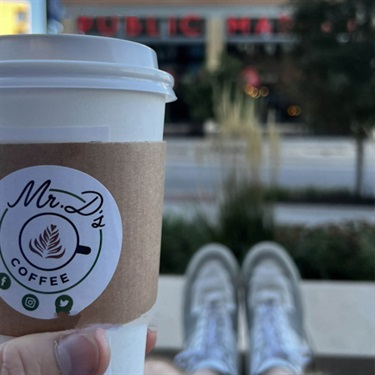 Holding drink from Mr. D's Coffee by Instagram user @austinshortgroup